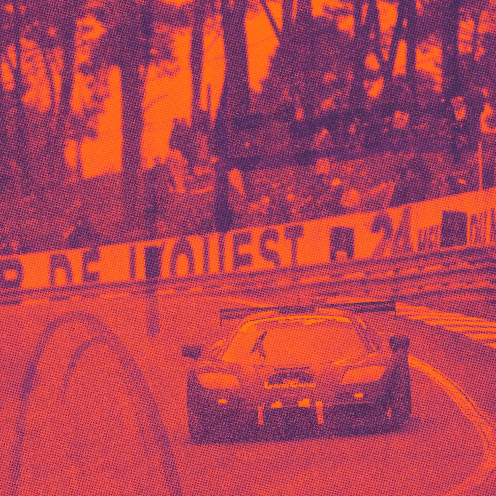 vintage-style image with a heavy orange filter showing a McLaren F1 GTR race car on a racetrack, with a forest and spectators in the background.