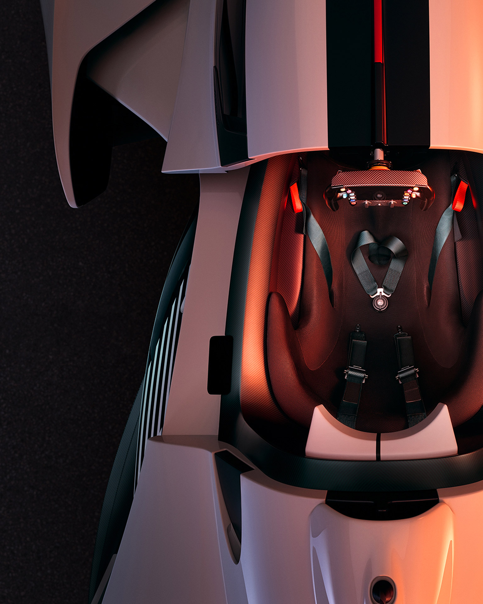 An overhead shot of the McLaren Solus GT's single-seat cockpit, showing the bespoke racing seat, six-point harness, and futuristic steering wheel.