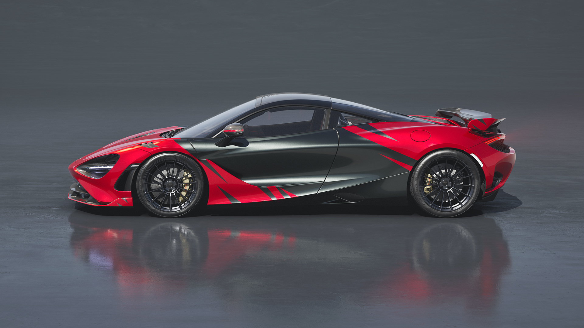 Side profile of the McLaren 750S JC96 with a two-tone red and black paint scheme and a large rear spoiler.