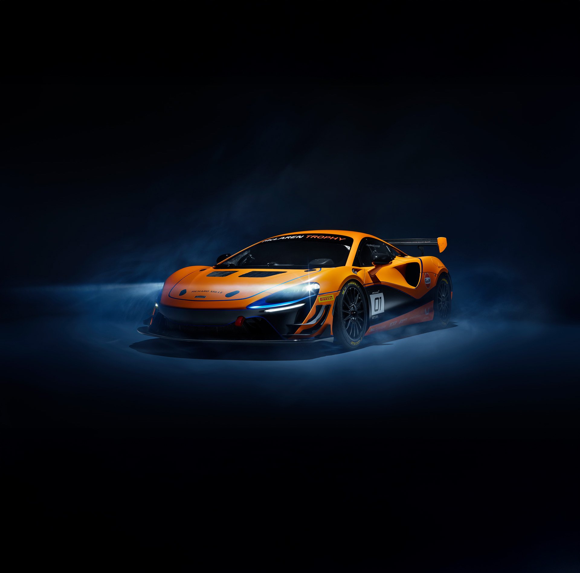 McLaren Artura Trophy with headlights on.