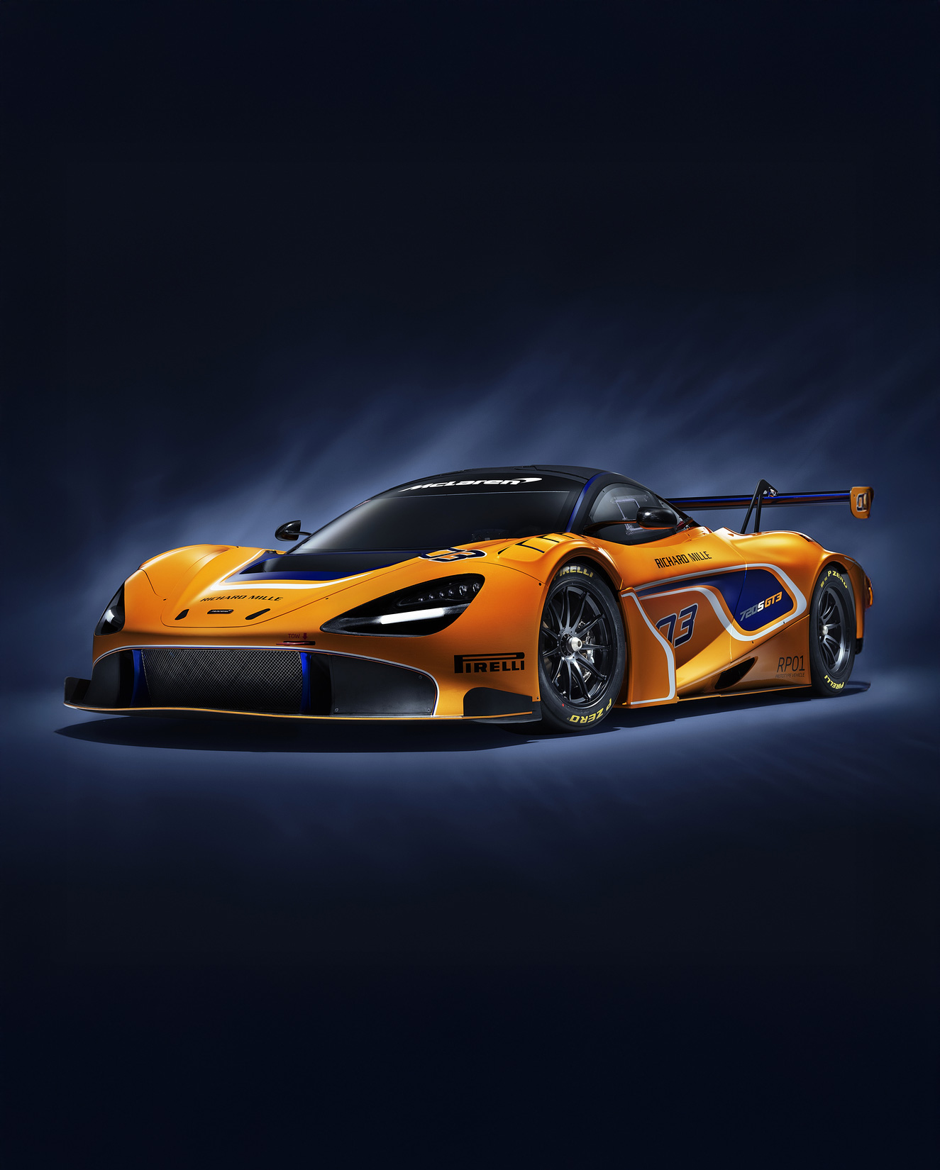 Orange McLaren 720S GT3 on a dark background.