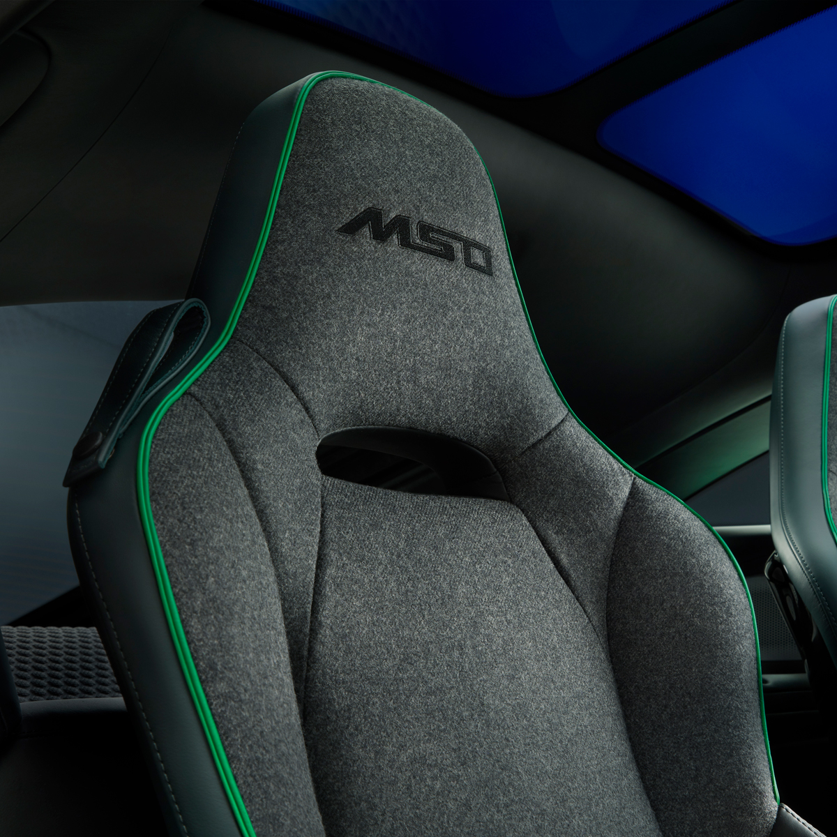 McLaren Verdant theme GT, MSO branded seat with green detailing.