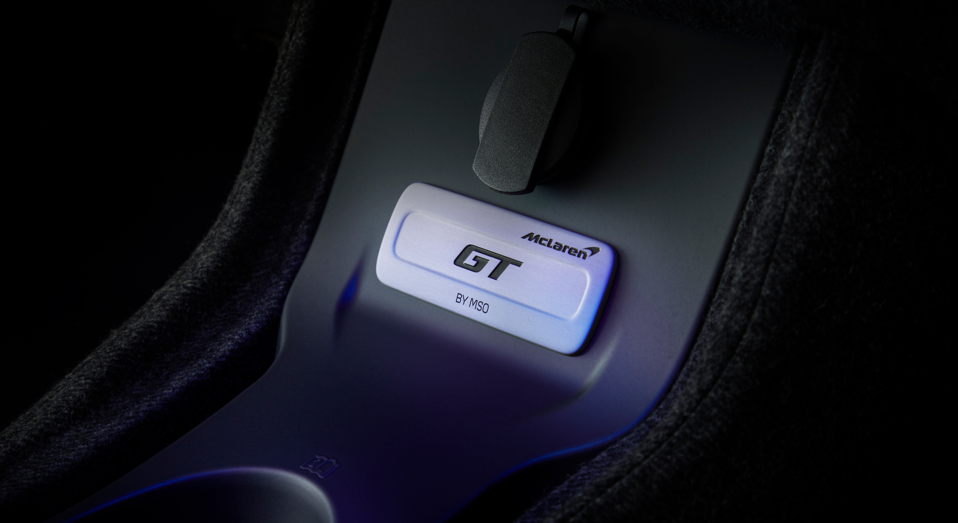 Close up of 'GT by MSO' plaque on McLaren Verdant theme GT.