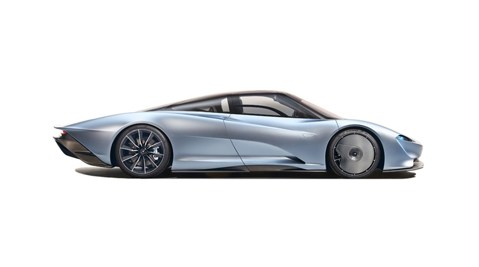 Side view of a light silver McLaren Speedtail, shown on a white background.