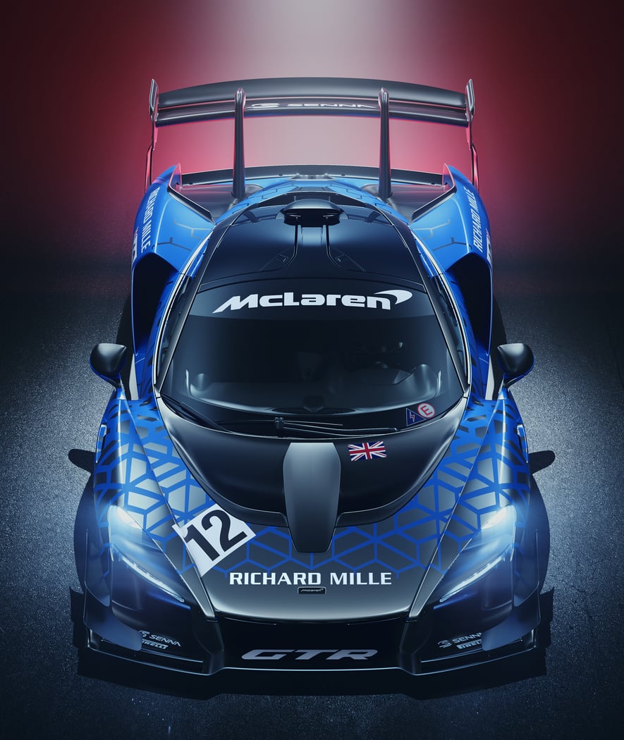 A high-angle shot of the McLaren Senna GTR with a bespoke blue and black racing livery.