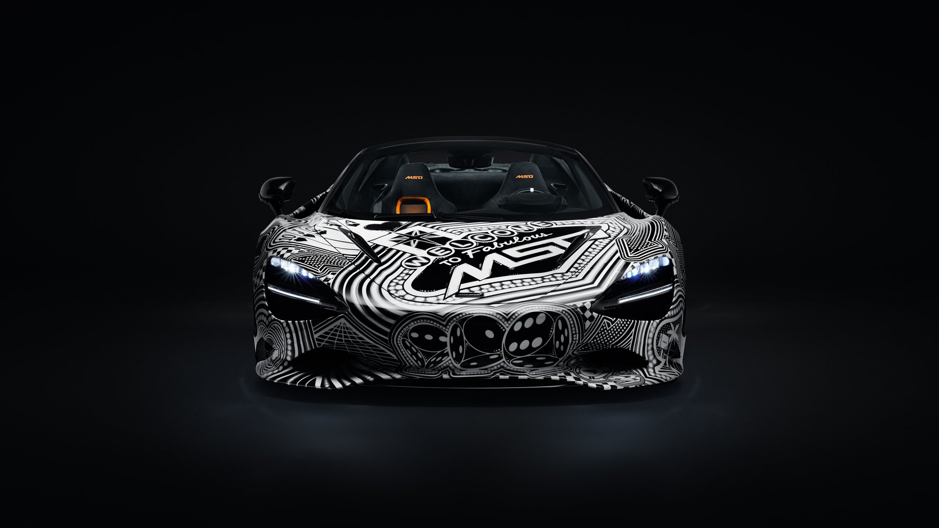 Direct front view of the McLaren 750S Spider 'Project Viva' by MSO, showcasing the 'Welcome to Fabulous' design integrated into the bespoke, black-and-white livery.