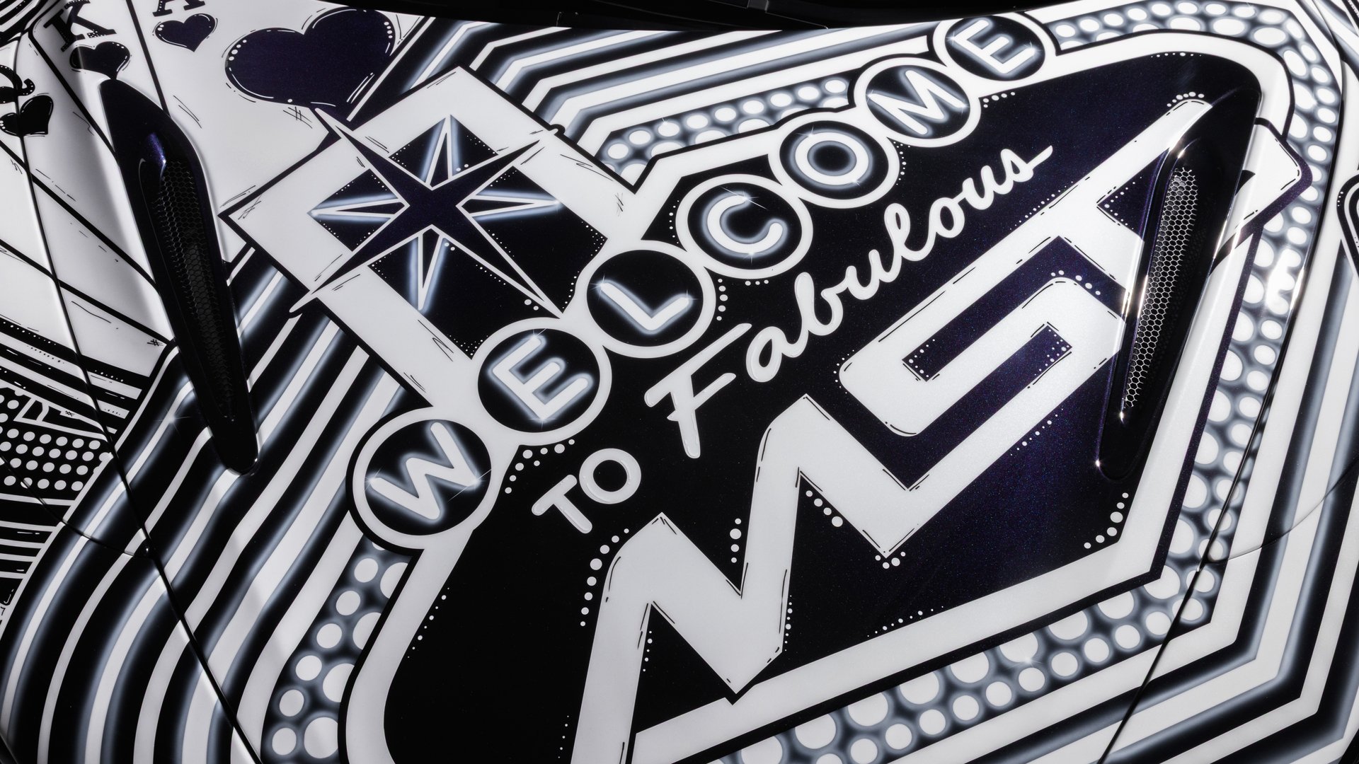 Detailed close-up of the MSO Project Viva bonnet graphic featuring a neon-style 'Welcome to Fabulous' text and the MSO logo, symbolizing the Las Vegas theme.