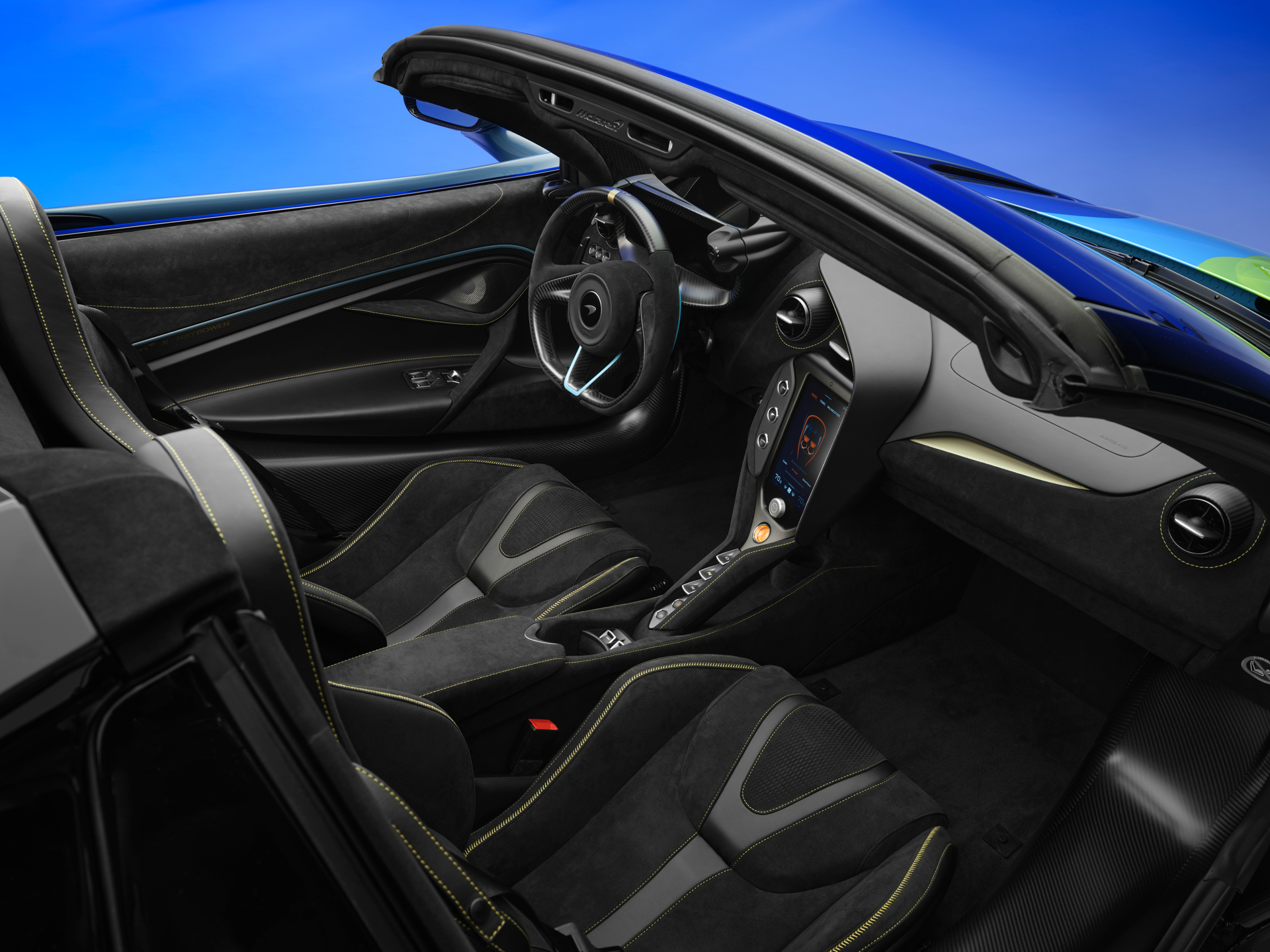 The interior of the The Project Chromology 750s by MSO and Nat Bowen, on display against a glowing blue background.